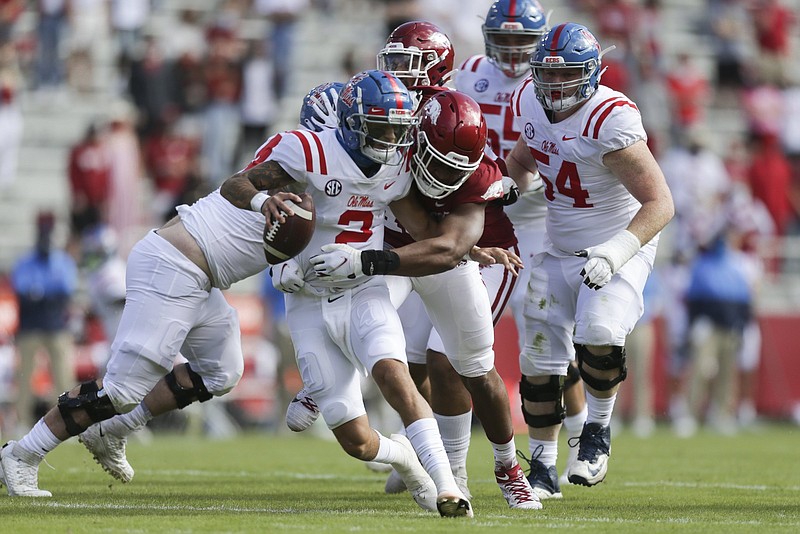 Ole Miss quarterback Matt Corral (2) led the nation in total offense last season, but he struggled in a loss at Arkansas, throwing six interceptions. “I can promise you one thing,” Corral said this week at SEC Media Days. “The next time I play that defense, it’s going to be much different.”
(NWA Democrat-Gazette/Charlie Kaijo)