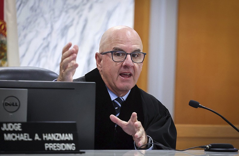 Miami-Dade Circuit Judge Michael Hanzman speaks Wednesday during a hearing in Miami, at which tenants shared their thoughts regarding the future of the site of the Champlain Towers South building that collapsed in Surfside, Fla.
(AP/Miami Herald/Carl Juste)
