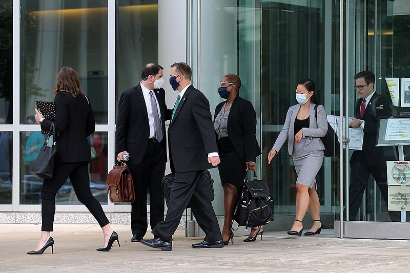 FILE — The team from the office of Attorney General Leslie Rutledge leaves court after U.S. District Judge James M. Moody rejected the state’s arguments and blocked a state law that would ban gender disphoria treatment for minors in this July 21, 2021 file photo.
(Arkansas Democrat-Gazette/Thomas Metthe)