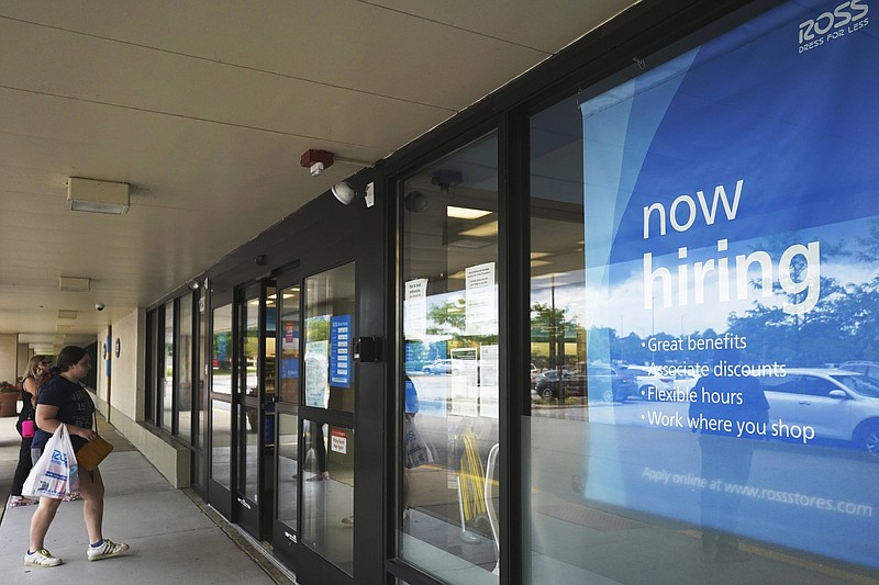 A hiring sign is displayed at a retail store in Schaumburg, Ill., on July 15. Companies have posted the highest number of available jobs in the two decades that the data has been tracked.
(AP/Nam Y. Huh)