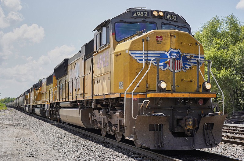 A Union Pacific train travels through Union, Neb., in this file photo. The Omaha, Neb.-based railroad said Thursday that it earned $1.8 billion, or $2.72 per share, in the second quarter.
(AP/Nati Harnik, File)