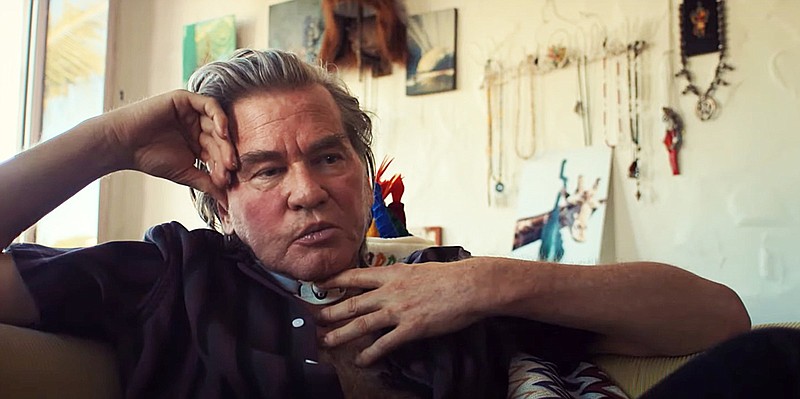 In the new documentary “Val,” constructed from personal home videos shot by the actor over the past 40 years, actor Val Kilmer, a throat cancer survivor, uses a voice box to speak.