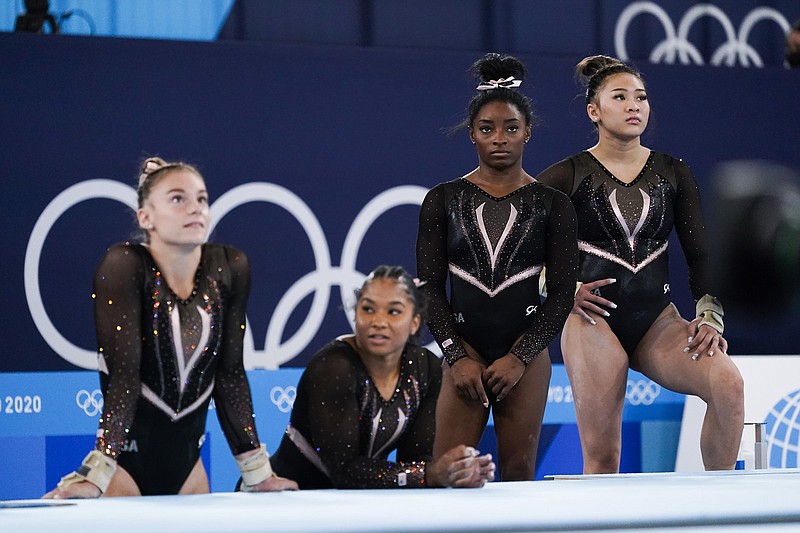 Gold medalist Simone Biles (second from right), Sunisa Lee (right) and Jordan Chiles — all minorities — make up half of the U.S. Olympic gymnastics team. Biles and Chiles are Black, while Lee is Hmong-American.
(AP/Ashley Landis)
