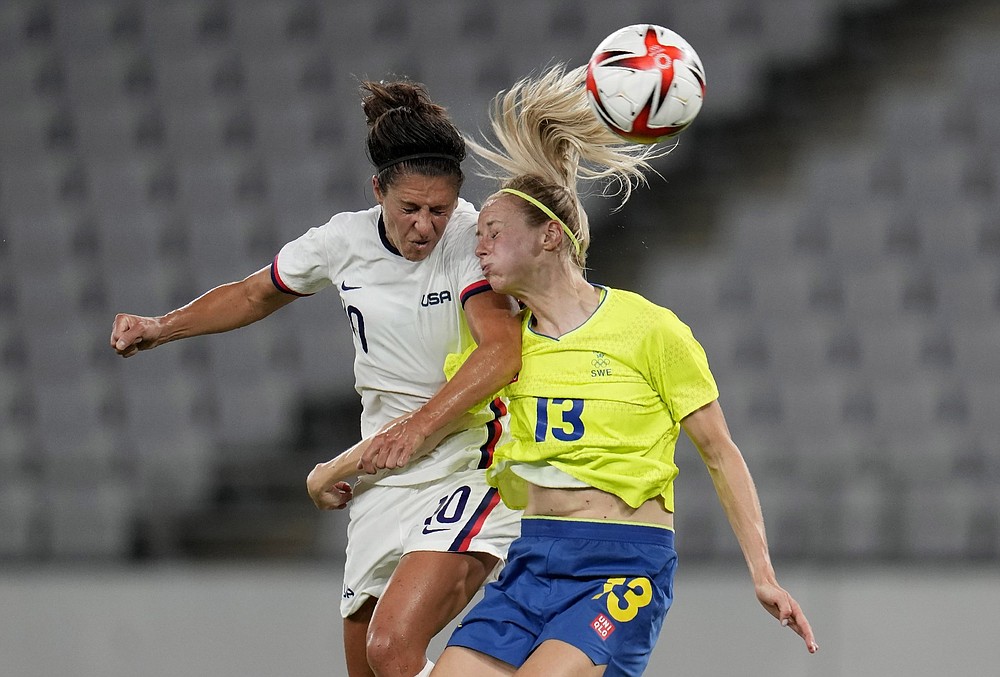 Carli Lloyd (left) and the United States women’s soccer team try to even their record in Olympic play today when they take on New Zealand. Coverage begins at 6:30 a.m. Central on NBCSN.
(AP/Ricardo Mazalan)