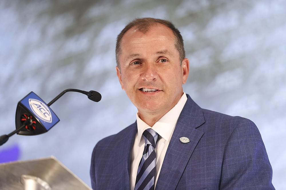 Atlantic Coast Conference commissioner Jim Phillips speaks during the NCAA college football ACC media days in Charlotte, N.C., Wednesday, July 21, 2021. (AP Photo/Nell Redmond)
