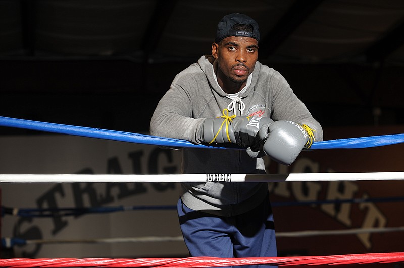 FILE -- Boxer Kalvin "Hot Sauce" Henderson works out Wednesday, July 20, 2016, at Straightright Boxing and Fitness in Springdale. (NWA Democrat-Gazette/ANDY SHUPE)