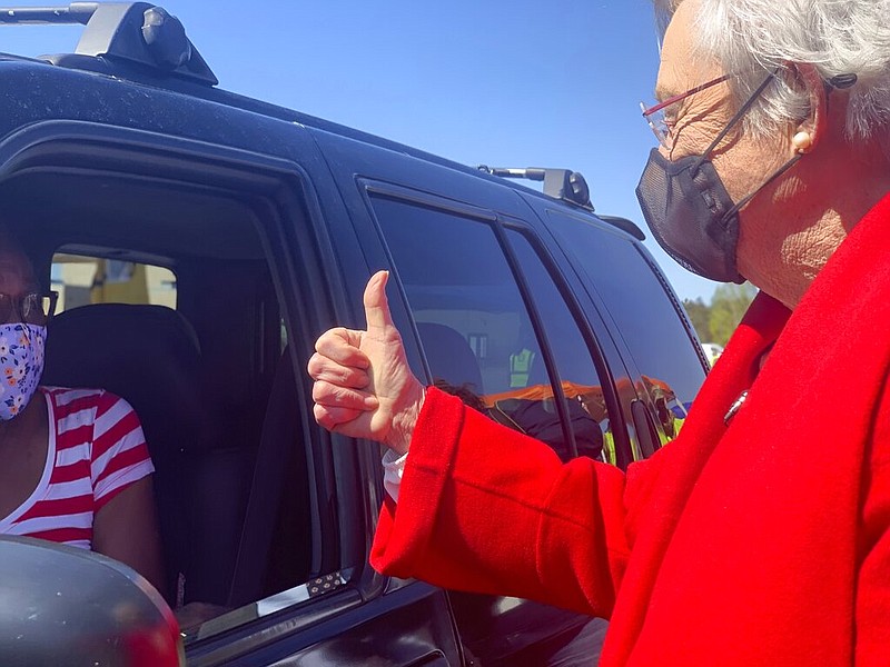 Alabama Gov. Kay Ivey gives a thumbs-up to Doris Coleston after Coleston received a covid-19 vaccination at a clinic in Camden, Ala., on Friday, April 2, 2021. (AP/Kim Chandler)