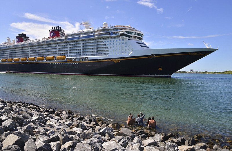 The Disney Dream sails out of Port Canaveral, Fla., on a two-night test sail, also known as a simulation cruise, in this July 17, 2021, file photo. (Malcolm Denemark/Florida Today via AP)