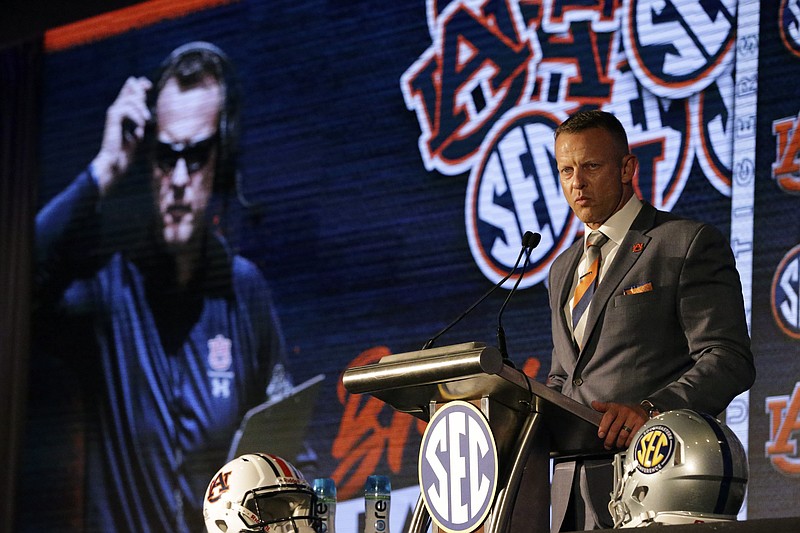 Auburn head coach Bryan Harsin speaks to reporters during an NCAA college football news conference at the Southeastern Conference media days, Thursday, July 22, 2021, in Hoover, Ala. (AP Photo/Butch Dill)