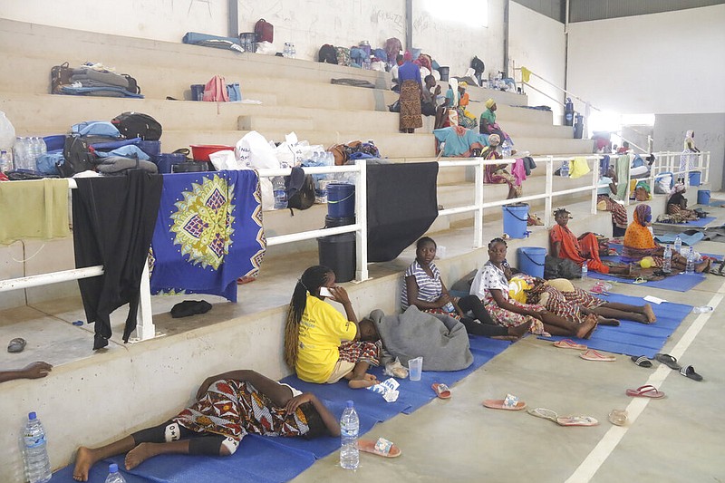 Refugees seek shelter at a center in Afungi, Mozambique, on April 2, 2021, after fleeing attacks in Palma in Northern Mozambique, a region coping with terrorism. (AP Photo)