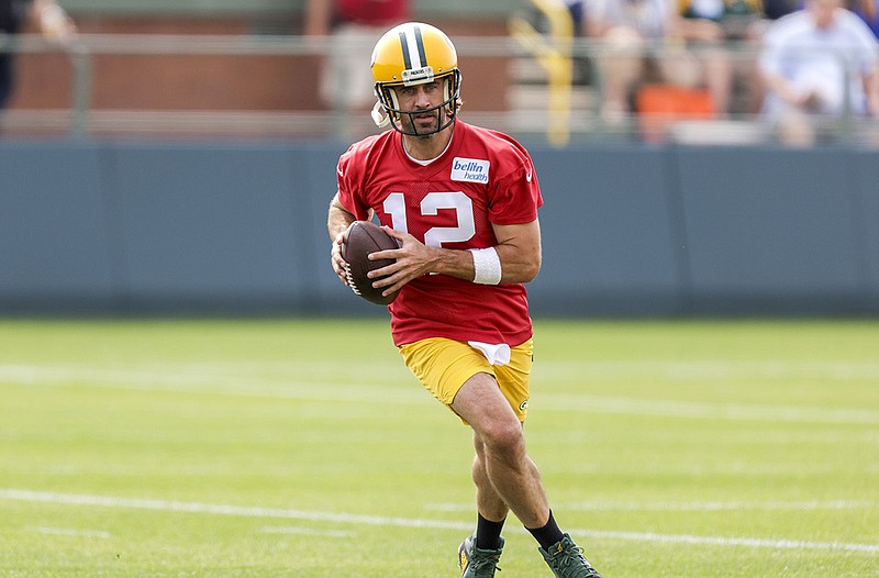 Green Bay quarterback Aaron Rodgers had his first training-camp workout with the Packers on Wednesday. He said afterward some issues that caused him to skip organized team activities and mandatory minicamp remain unresolved.
(AP/Matt Ludtke)