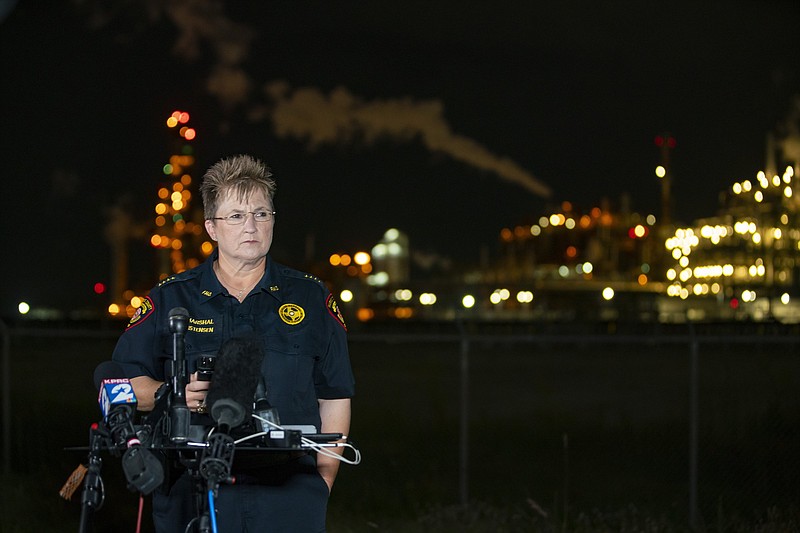 Harris County Fire Marshal Laurie Christensen said Tuesday in La Porte, Texas, that some of the leaked chemicals can be toxic if inhaled. Video at arkansasonline.com/729texas/.
(AP/Houston Chronicle/Mark Mulligan)