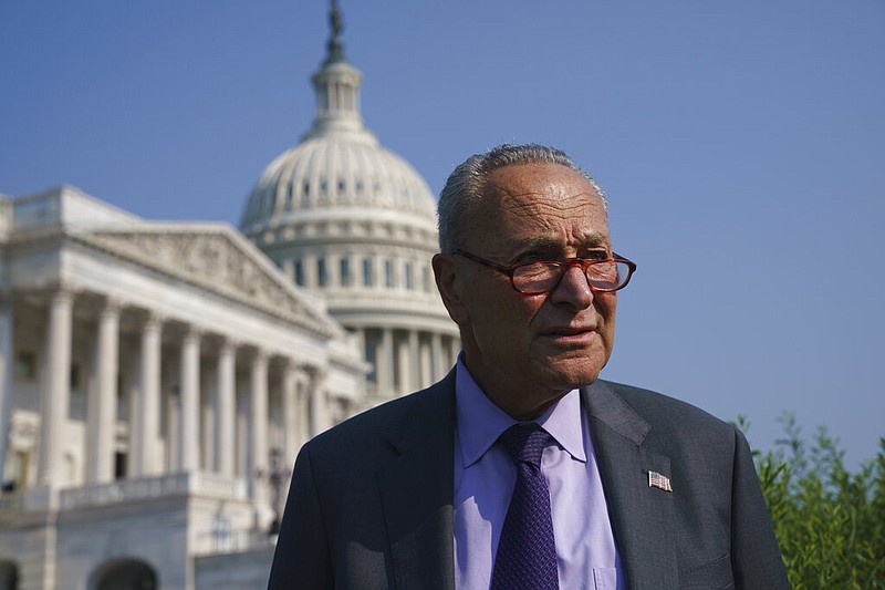 Senate Majority Leader Charles Schumer, D-N.Y., arrives to meet with Speaker of the House Nancy Pelosi, D-Calif., before an event to promote investments in clean jobs, at the Capitol in Washington, Wednesday, July 28, 2021. (AP Photo/J. Scott Applewhite)