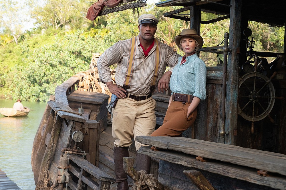 Frank (Dwayne Johnson) and Lily (Emily Blunt) are a 21st-century analogue to Humphrey Bogart and Katharine Hepburn in “The African Queen” in Disney’s “Jungle Cruise,” which also incorporates elements of ’80s action adventure movies.