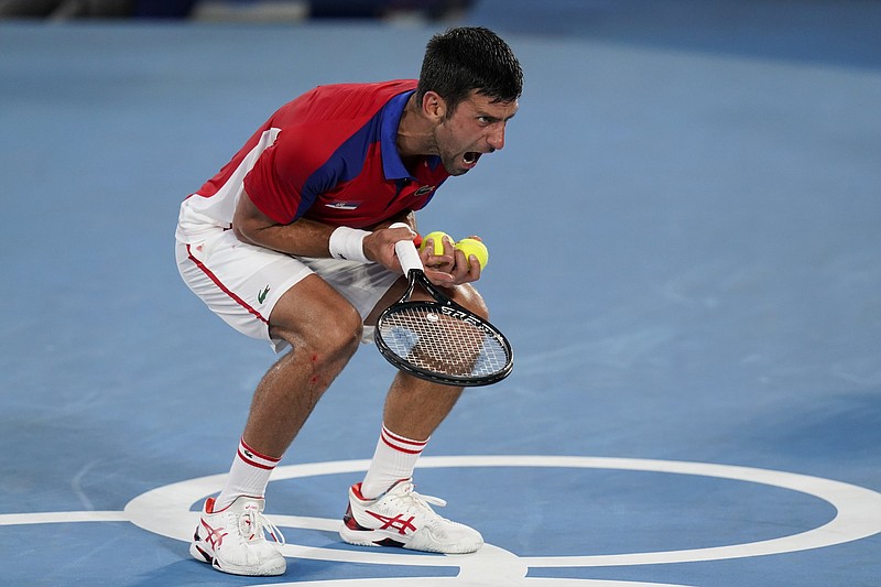 Serbia’s Novak Djokovic reacts Friday during his Olympics men’s singles tennis semifinal match against Germany’s Alexander Zverev at Tokyo. Zverev won the match 1-6, 6-3, 6-1. 
(AP/Patrick Semansky)