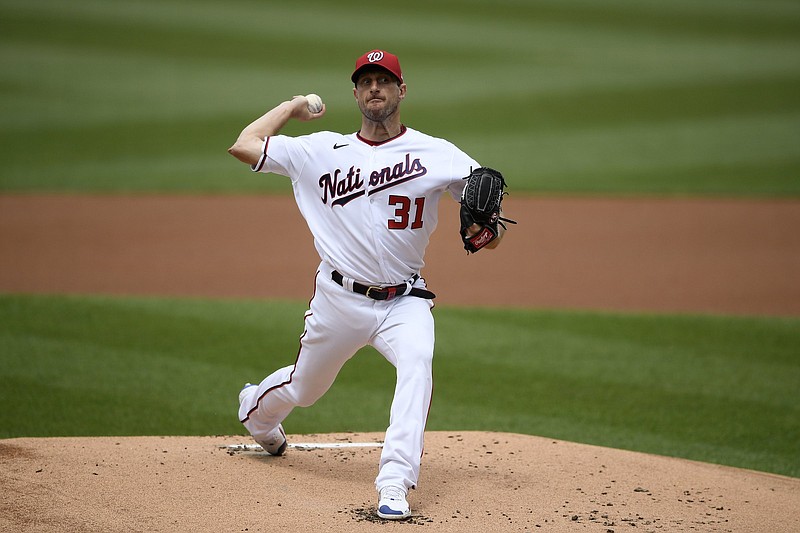 Washington Nationals starting pitcher Max Scherzer delivers a pitch during the first inning of a baseball game against the San Diego Padres, Sunday, July 18, 2021, in Washington. (AP Photo/Nick Wass)
