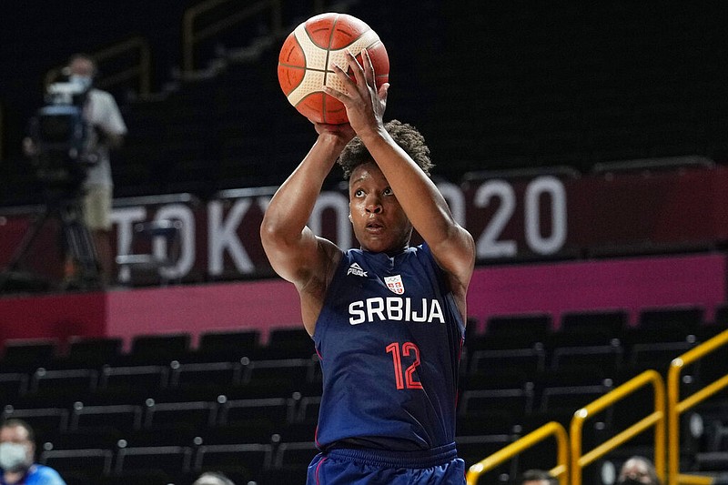Serbia's Yvonne Anderson (12) shoots against Spain during a women's basketball game at the 2020 Summer Olympics, Thursday, July 29, 2021, in Saitama, Japan. (AP/Eric Gay)