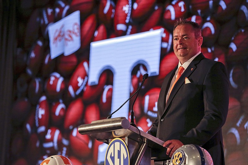 Tennessee head coach Josh Heupel speaks to reporters during a Southeastern Conference Media Days NCAA college football news conference, Tuesday, July 20, 2021, in Hoover, Ala. (AP Photo/Butch Dill)