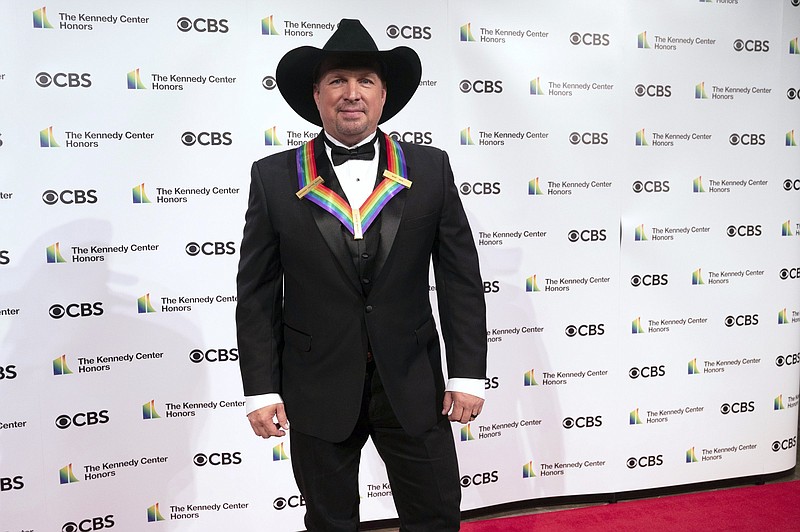 2020 Kennedy Center honoree Garth Brooks attends the 43nd Annual Kennedy Center Honors at The Kennedy Center on Friday, May 21, 2021, in Washington. (AP Photo/Kevin Wolf)