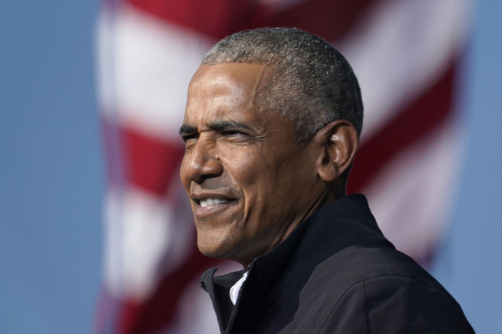 In this Nov. 2, 2020 file photo, former President Barack Obama speaks at a rally as he campaigns for Democratic presidential candidate former Vice President Joe Biden at Turner Field in Atlanta. Obama has scaled down his 60th birthday bash due to the surge in the delta variant of the coronavirus.
(AP Photo/Brynn Anderson)