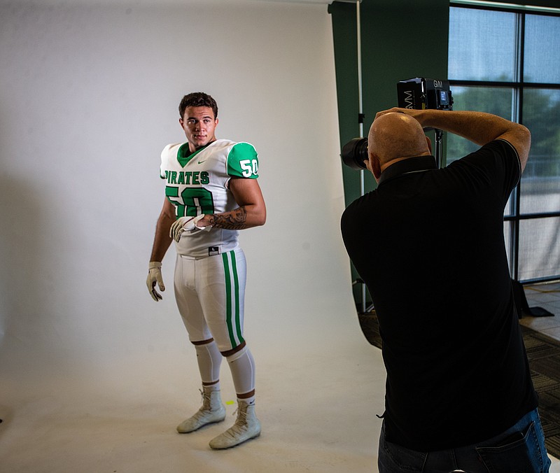 JJ Hollingsworth (50) of Greenland and NWADG photographer Spencer Tirey at the NWADG football media day at Arvest Ballpark, Springdale, Arkansas, Tuesday, August 3, 2021 (Special to NWA Democrat-Gazette/David Beach)