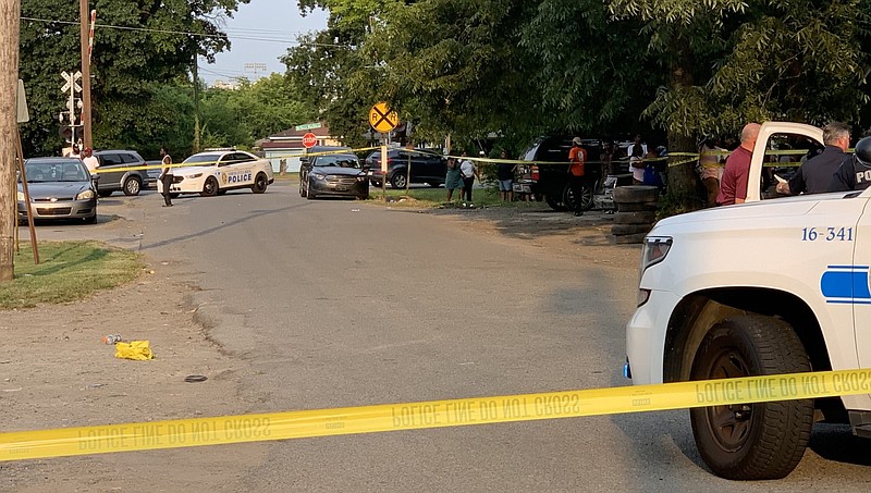 North Little Rock police investigate a homicide on West 24th Street on Thursday, Aug. 5, 2021. (Arkansas Democrat-Gazette/William Sanders)