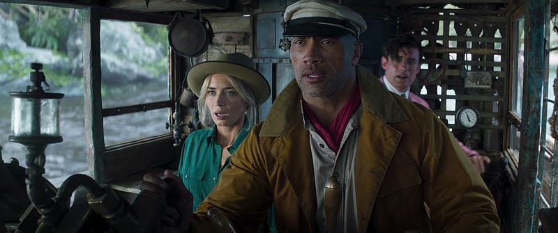Lily (Emily Blunt), Frank (Dwayne Johnson) and MacGregor (Jack Whitehall) appear in a scene from “Jungle Cruise,” which floated to the top spot at the box office.