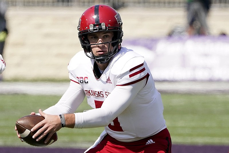 Arkansas State quarterback Layne Hatcher prepares to pass the ball to wide receiver Jonathan Adams Jr. to score the winning touchdown during the second half of an NCAA college football game against Kansas State, Saturday, Sept. 12, 2020, in Manhattan, Kan. (AP Photo/Charlie Riedel)