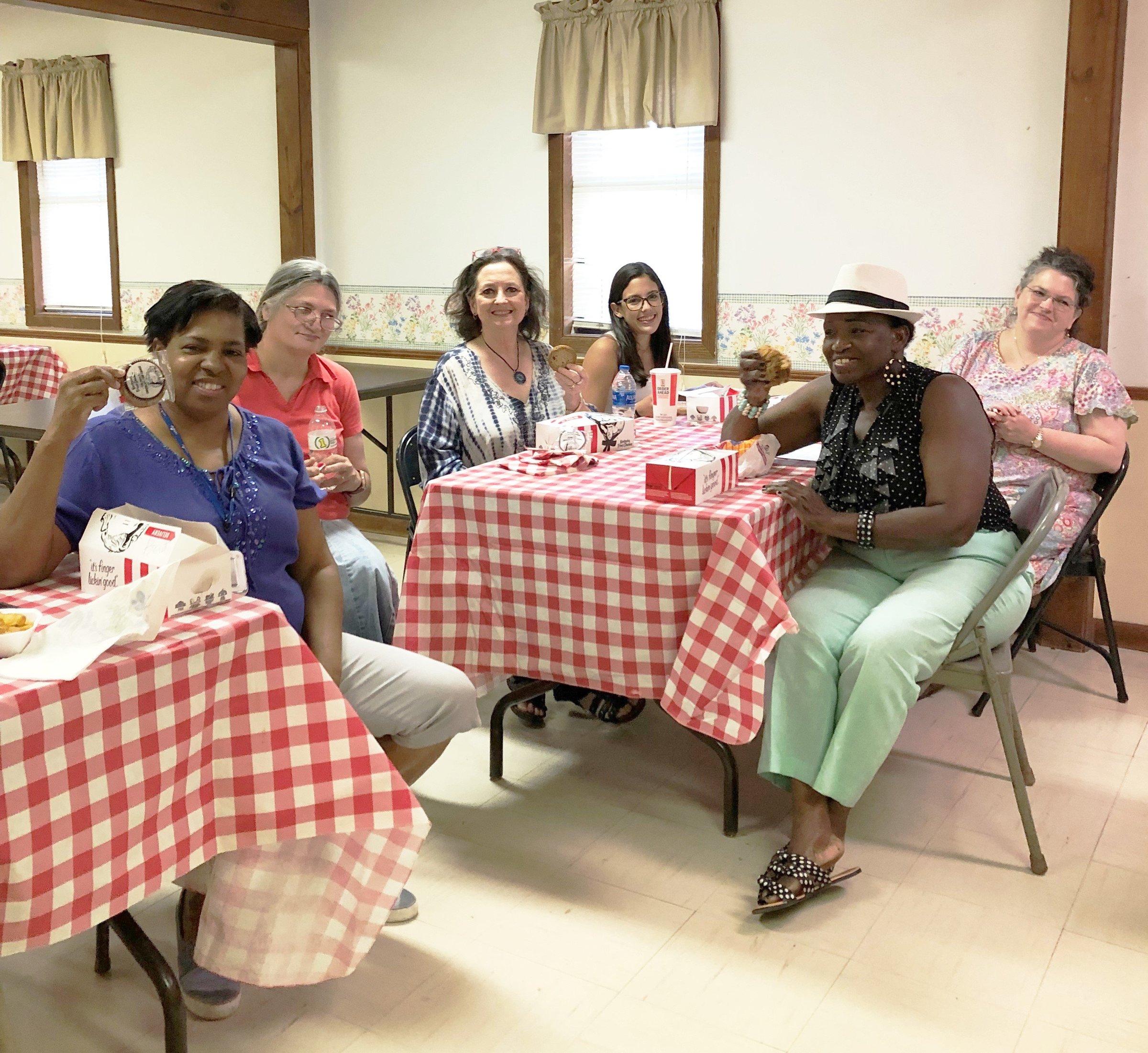 Homemakers donate cash to church