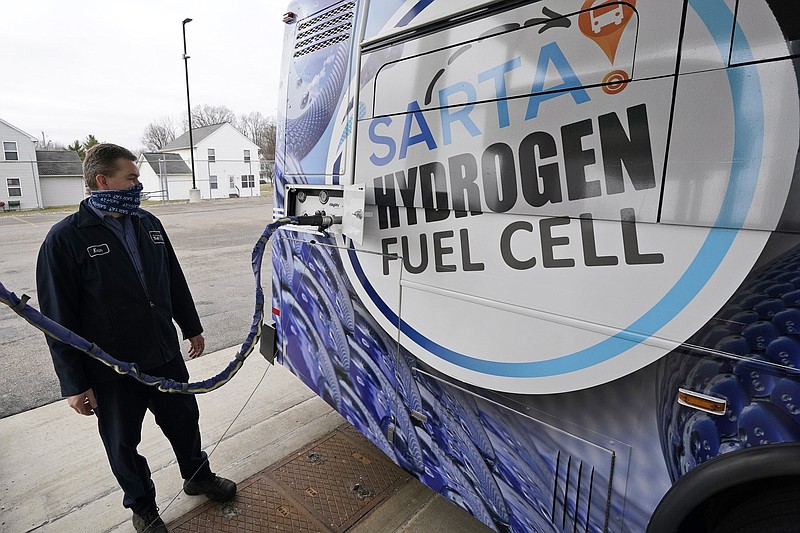 Kevin Baker, a maintenance technician, refuels a hydrogen fuel cell bus in Canton, Ohio. Hydrogen vehicles are increasingly viewed as an alternative to the planet’s 1.2 billion cars and trucks, nearly all of which burn gasoline and diesel fuel.
(AP/Tony Dejak)