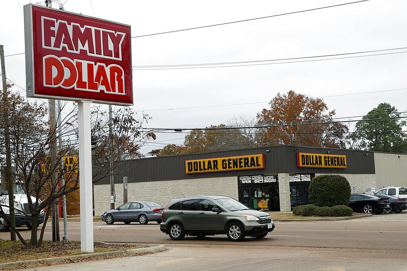 A Family Dollar sign is across the street from a Dollar General in north Jackson, Miss., in this Nov. 26, 2019, file photo. (AP/Rogelio V. Solis)