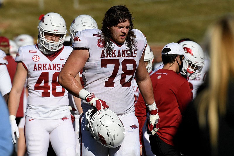 Arkansas senior tackle Dalton Wagner, shown during a game last season, agreed with Coach Sam Pittman’s assessment last season that he wanted the Razorbacks’ linemen to be not only stronger, but bigger as well. “It makes the game a lot easier being heavier,” Wagner said. See photos from Wednesday’s practice at arkansasonline.com/819practice.
(AP/L.G. Patterson)
