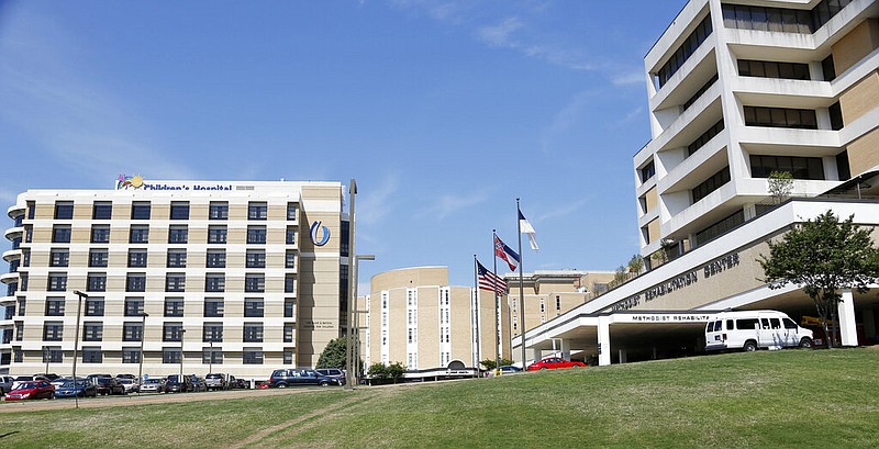 The children's hospital wing of the University of Mississippi Medical Center (left) is shown next to the neighboring Methodist Rehabilitation Center in Jackson, Miss., in this April 24, 2014, file photo. (AP/Rogelio V. Solis)