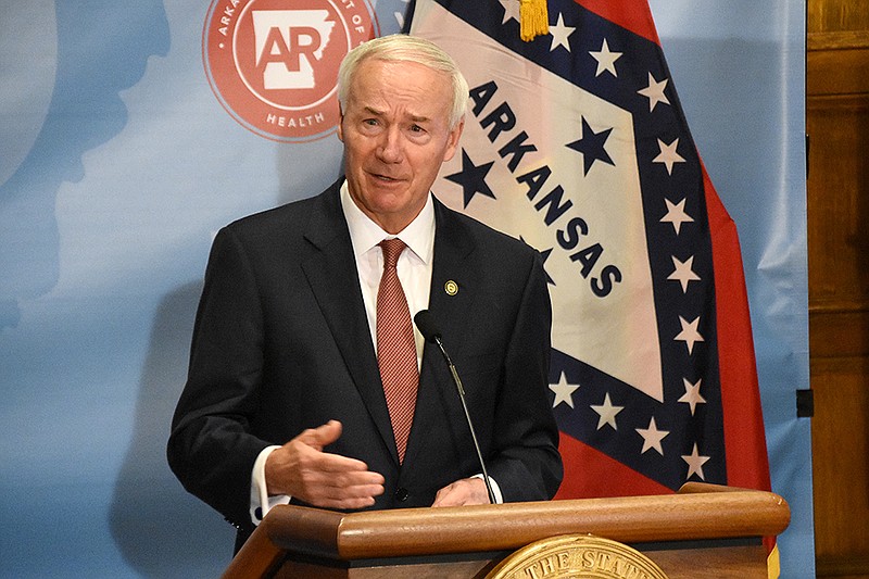 FILE — Gov. Asa Hutchinson answers questions from the media Thursday, Aug. 19, 2021, during the weekly coronavirus briefing at the state Capitol in Little Rock. (Arkansas Democrat-Gazette/Staci Vandagriff)