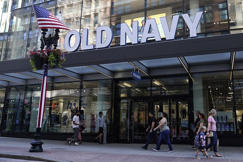 Pedestrians pass the Old Navy store in the Downtown Crossing shopping area, last month, in Boston.
(AP/Charles Krupa)