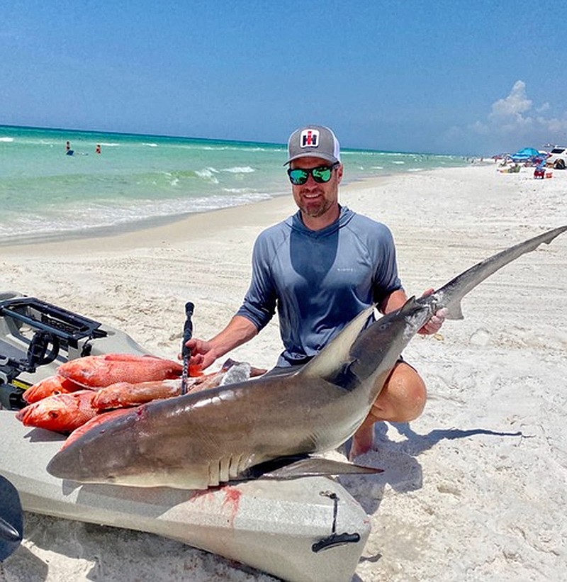 Brian Teeter of Little Rock caught a nice mess of mahi mahi and king mackerel about 4 miles offshore from Grayton Beach, Fla., while fishing with guide William Pentel. Fishing closer to shore in 2020, Teeter caught red snapper and shark(shown).
(Submitted photo)