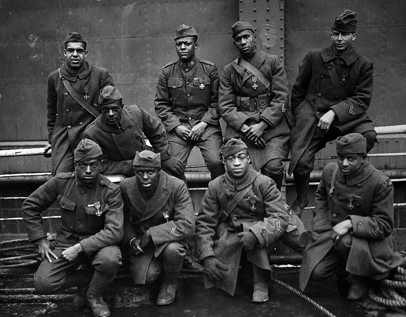 Members of the 369th Infantry Regiment, commonly known as the Harlem Hellfighters, strike a pose in this undated photo. The most celebrated Black soldiers of World War I were largely forgotten after returning to the United States, where they faced racism and discrimination.
(The New York Times/U.S. National Archives)
