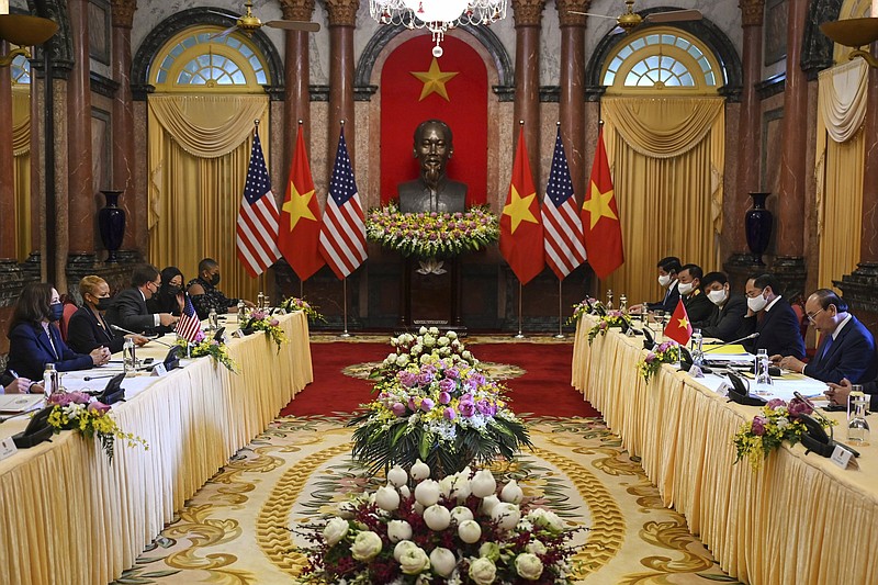 Vice President Kamala Harris (left) attends a meeting with Vietnam’s President Nguyen Xuan Phuc on Wednesday at the Presidential Palace in Hanoi, Vietnam.
(AP/Manan Vatsyayana)