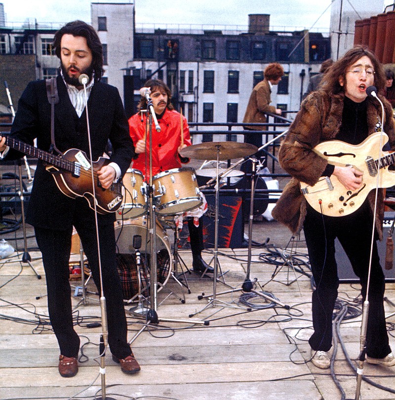 Beatles Paul McCartney, Ringo Starr and John Lennon perform up on the roof in Michael Lindsay-Hogg’s documentary “Let It Be” in 1969.