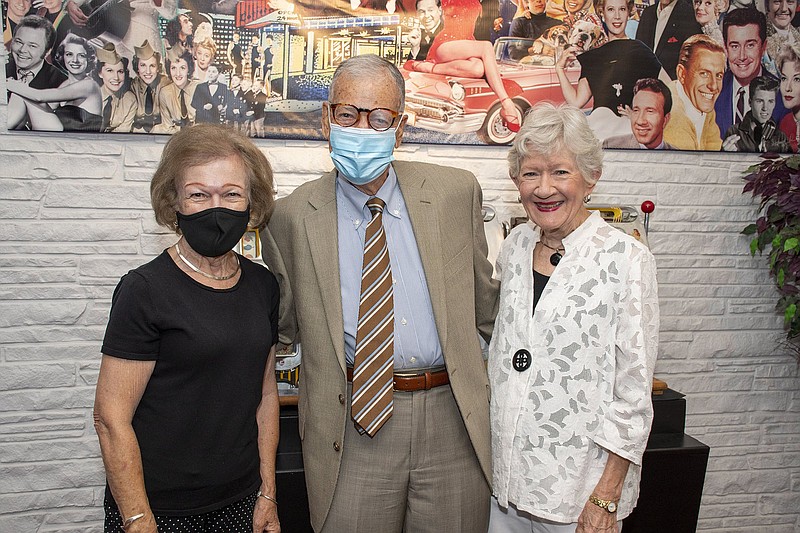 Janet Williams, honoree Don Munro and Pat Lile on 08/14/2021 at the Arkansas Walk of Fame Induction ceremony at The Vapors in Hot Springs. (Arkansas Democrat-Gazette/Cary Jenkins)
