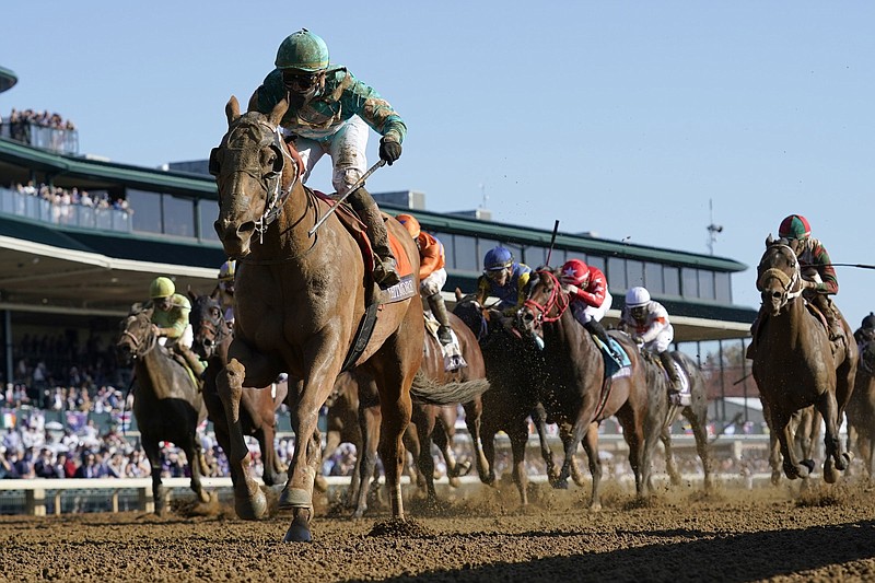 Irad Ortiz Jr., front, rides Whitmore to win the Breeders' Cup Sprint horse race at Keeneland Race Course, in Lexington, Ky., Saturday, Nov. 7, 2020. (AP Photo/Darron Cummings)