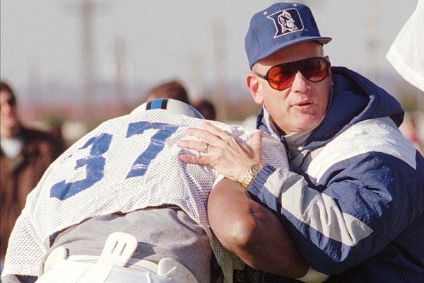 Fred Goldsmith of Duke works with Kentucky's Donte' Key and other lineman during practice Wednesday, Dec. 20, 1995 in Montgomery, Ala., in preparation for the Blue Gray All-Star Classic on Christmas Day. Goldsmith resurrected the Duke program in 1994 and decided to stay even though Miami and several other schools came calling. (AP Photo) Fred Goldsmith of Duke works with Kentucky's Donte' Key and other lineman during practice Wednesday, Dec. 20, 1995 in Montgomery, Ala., in preparation for the Blue Gray All-Star Classic on Christmas Day. Goldsmith resurrected the Duke program in 1994 and decided to stay even though Miami and several other schools came calling. (AP Photo)
