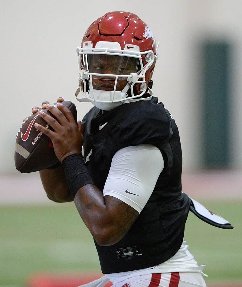 Arkansas quarterback KJ Jefferson throws Thursday, Aug. 12, 2021, during practice in the Willard and Pat Walker Pavilion on the university campus in Fayetteville. Visit nwaonline.com/210813Daily/ for today's photo gallery..(NWA Democrat-Gazette/Andy Shupe)
