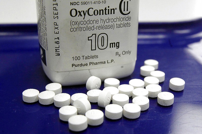 This Feb. 19, 2013, file photo shows pills of OxyContin, a form of oxycodone sold by Purdue Pharma, arranged for a photo at a pharmacy in Montpelier, Vt. (AP/Toby Talbot, file)