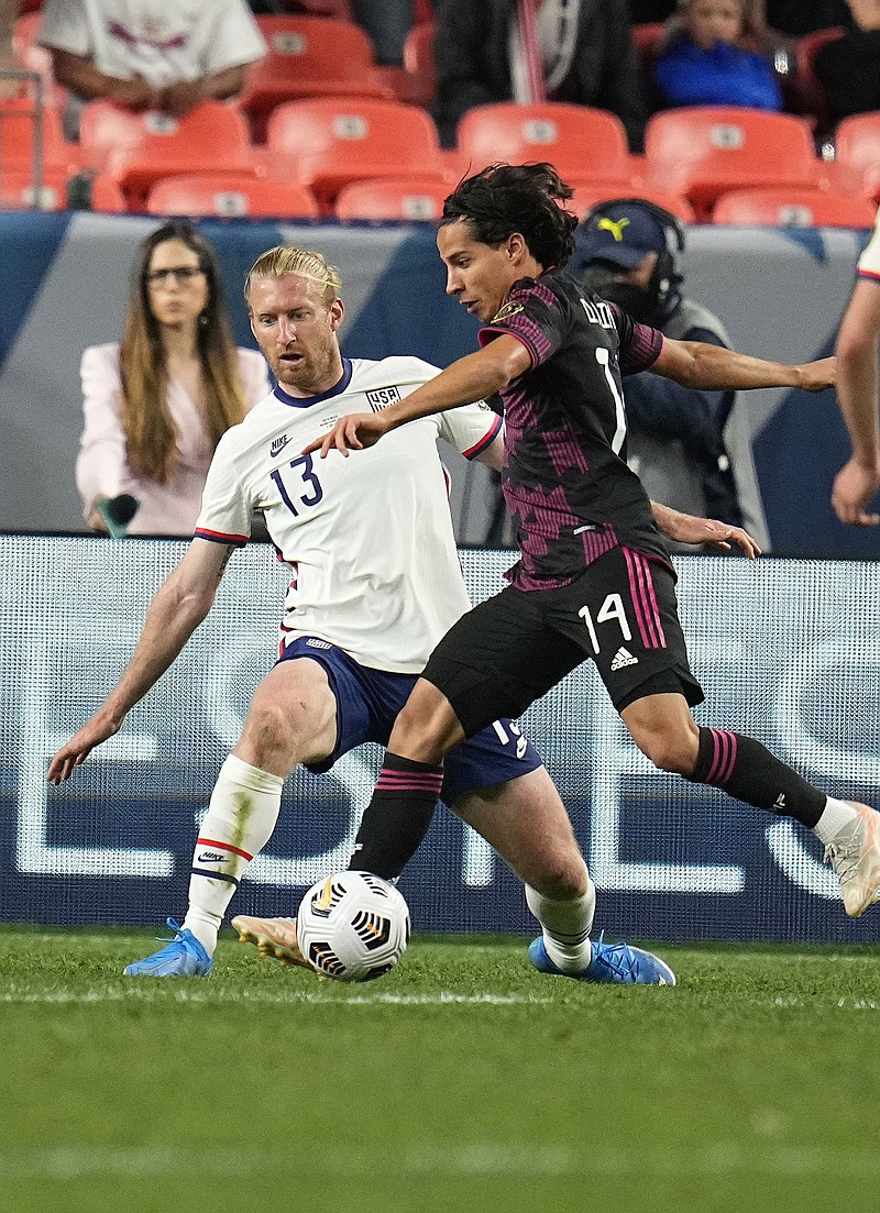 United States defender Tim Ream (left), shown in a match against Mexico in June, said the field for Thursday’s 0-0 draw at El Salvador was bumpy and dry, but the Americans did their best to work around it.
(AP/Jack Dempsey)