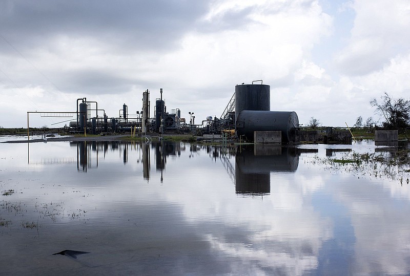 A refinery surrounded by water after Hurricane Ida near Cocodrie, La. Most of the Gulf of Mexico’s oil production remained shut down late this week as a result of the hurricane.
(Bloomberg WPNS/Mark Felix)