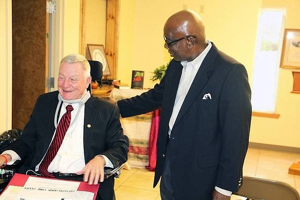 Simmons Foundation CEO Tommy May (left) spoke about the Go Forward Pine Bluff plan at various community town hall meetings and during a City Council meeting in early 2017. 
(Arkansas Democrat-Gazette file)