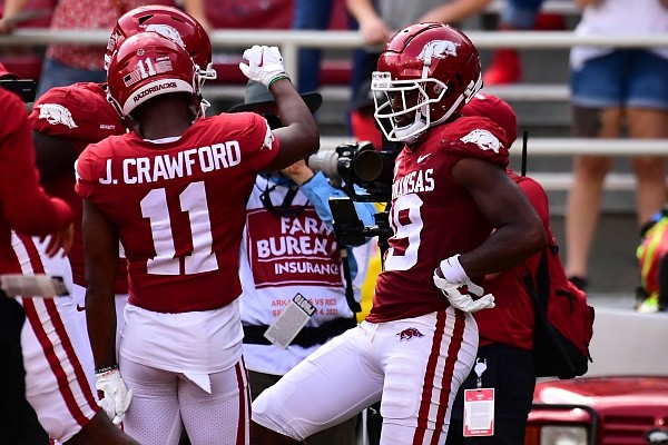 Arkansas receiver Tyson Morris celebrates after making a touchdown catch in Arkansas' season-opening victory over Rice on Sept. 4, 2021, in Fayetteville.