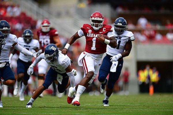 Arkansas quarterback KJ Jefferson (1) runs for a touchdown during the first quarter of a game against Rice on Saturday, Sept. 4, 2021, in Fayetteville.