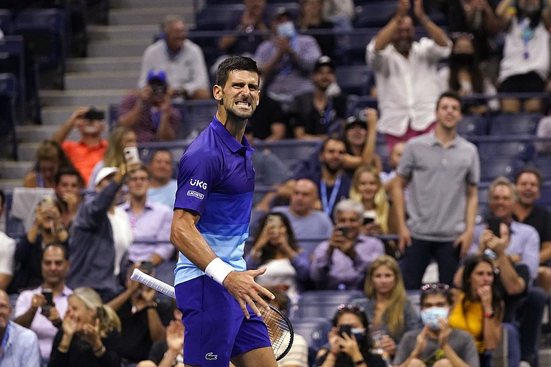 Novak Djokovic reacts after a point during his victory over Italy’s Matteo Berrettini on Wednesday night in the men’s quarterfinals at the U.S. Open.
(AP/Frank Franklin II)